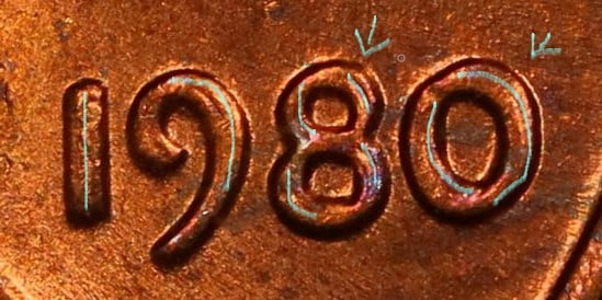 1980 doubled die penny with marks showing doubling
